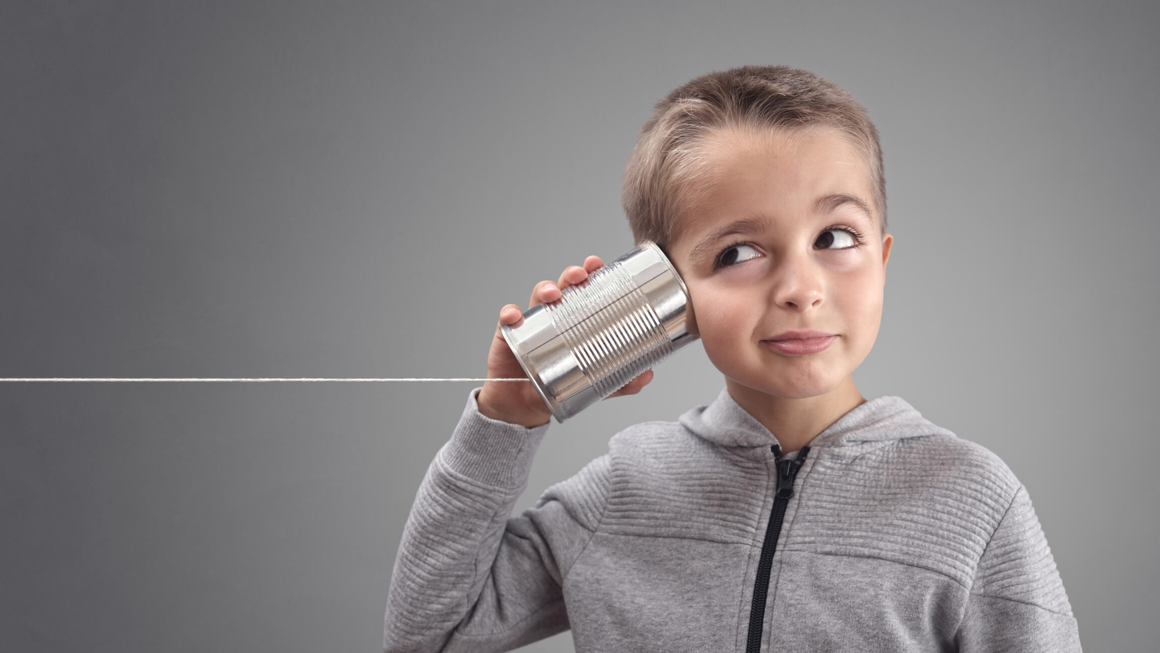 Tin can phone listening to curious good news