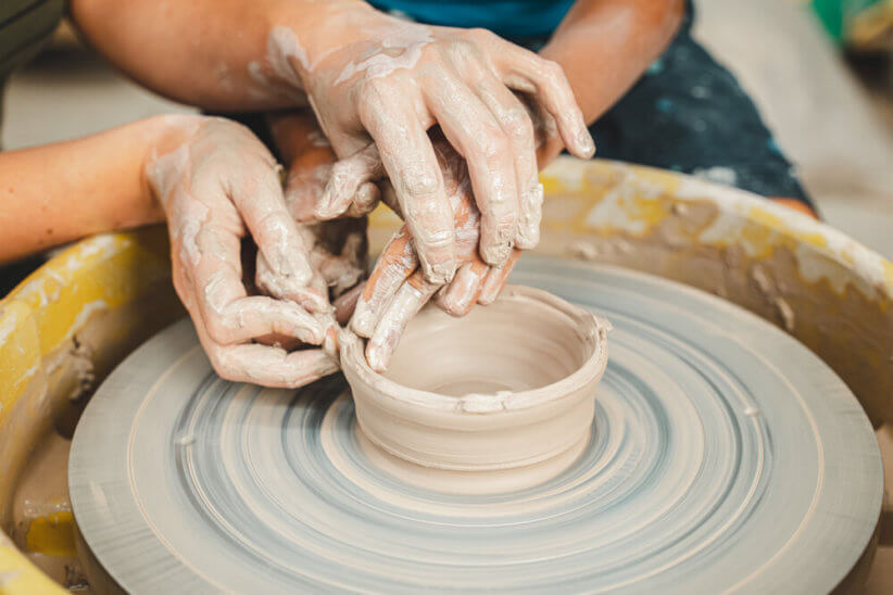 Learn how to use the potter's wheel at Clay Art Center.